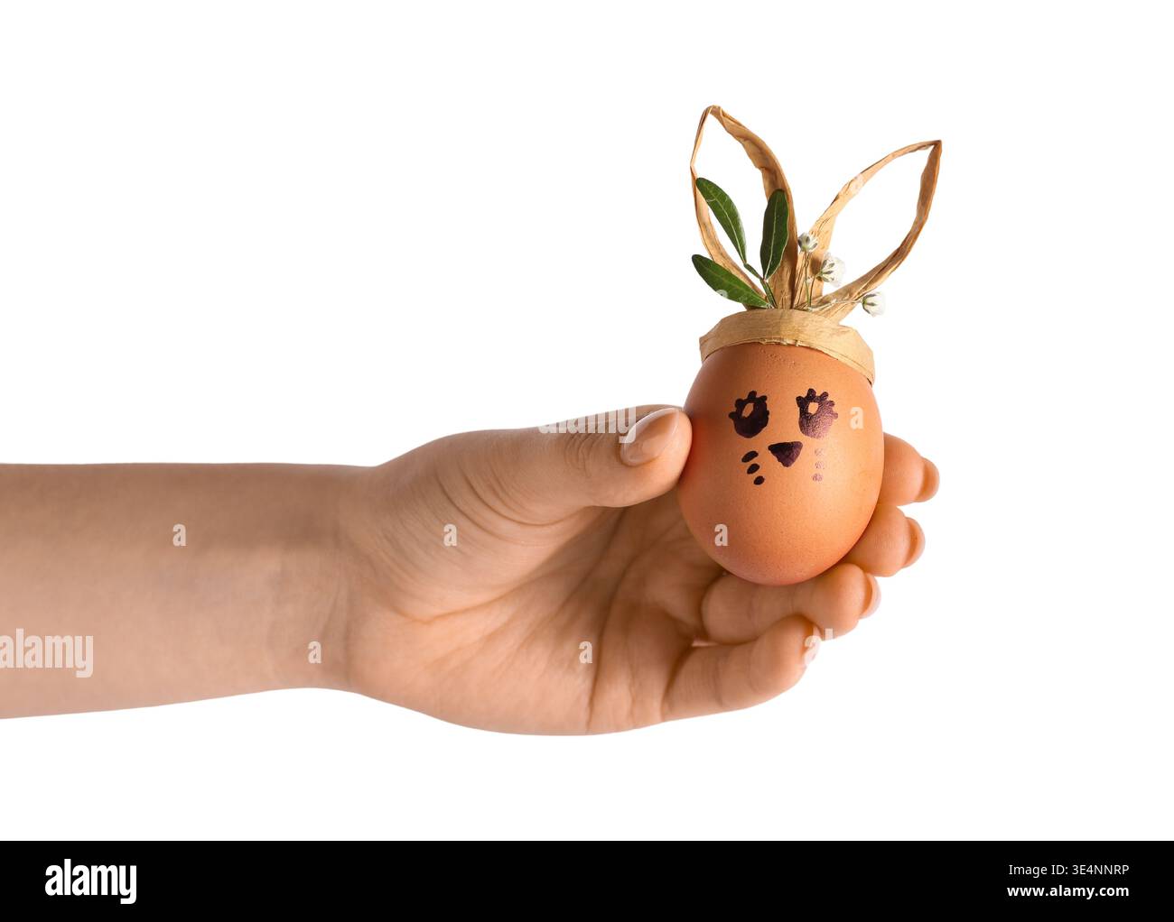 Female hand with creative Easter egg on white background Stock Photo