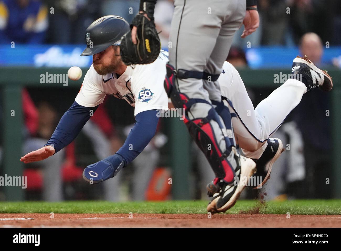 Seattle Mariners Brendan Donovan Slides Into Home To Score On An RBI Seattle Mariners Brendan Donovan Slides Into Home To Score On An Rbi Double From Victor Robles Against The Cleveland Guardians During The Second Inning Of A Baseball Game Saturday March 28 2026 In Seattle Ap Wasson 3E4NRC0 