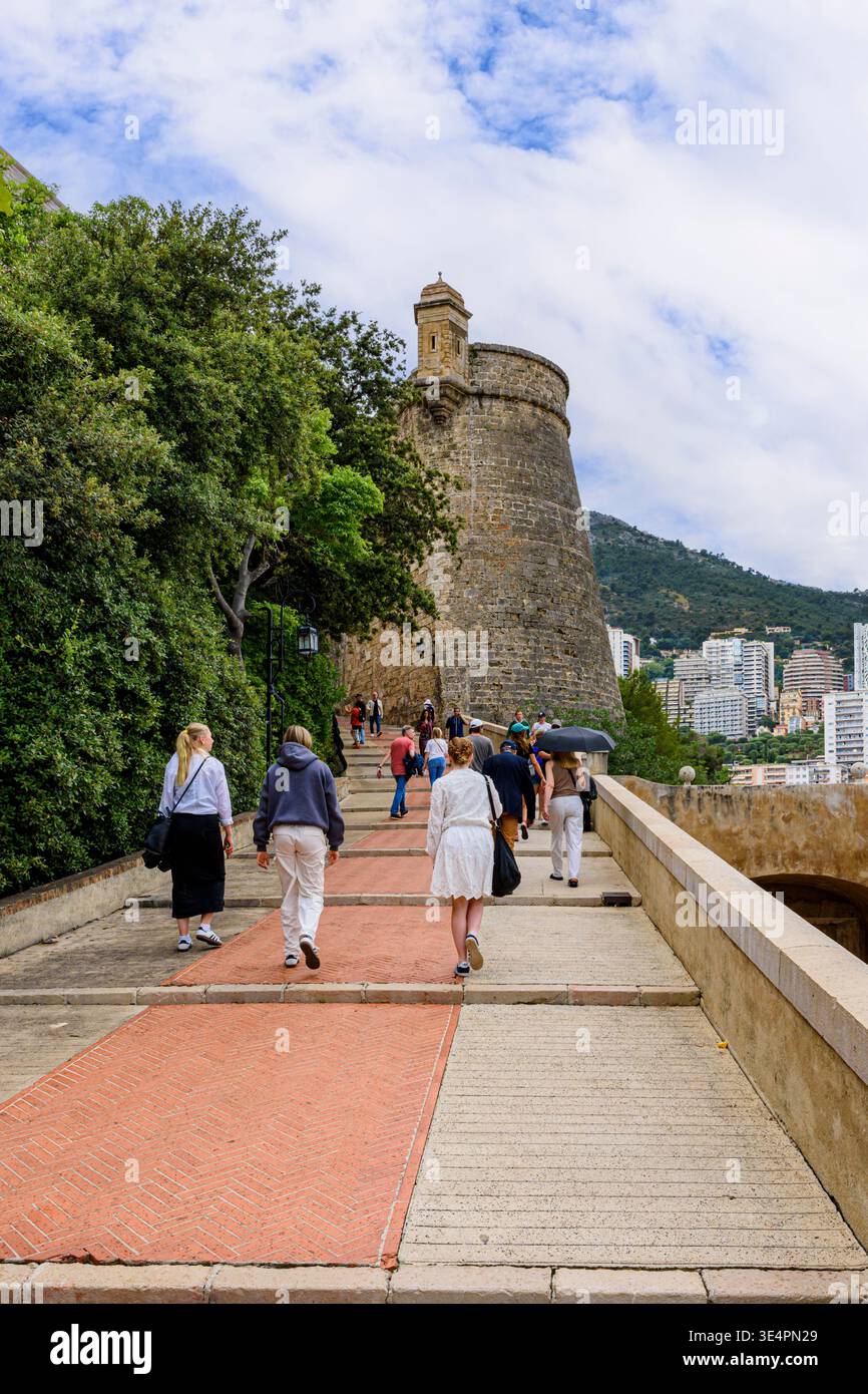 Tourists Walking Up The Rampe De La Major Towards The 15th Century 
