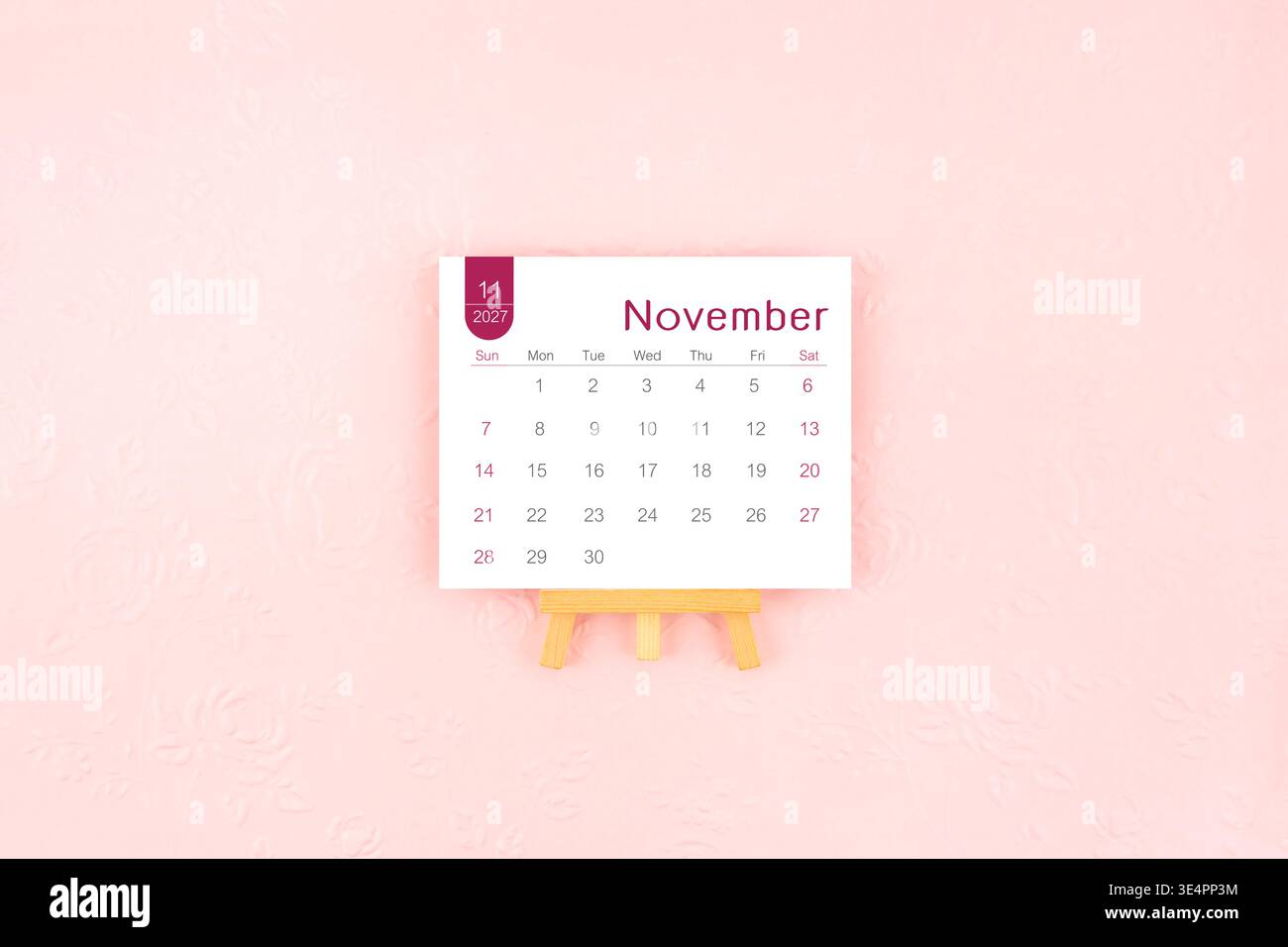 November 2027 Monthly desk calendar on blue color background, Position with  copy space Stock Photo - Alamy