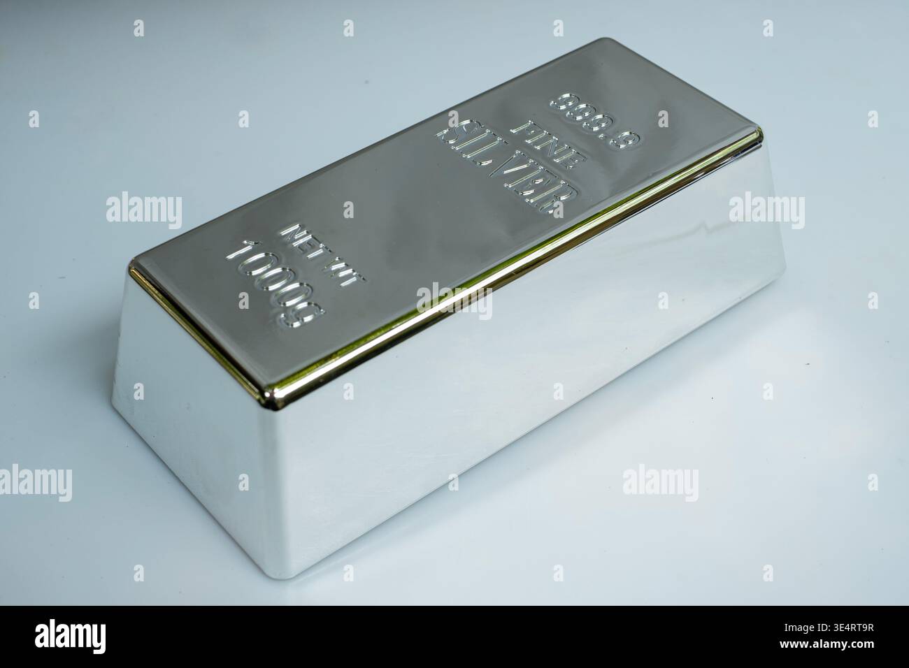 Fine silver bar isolated on a grey background Stock Photo