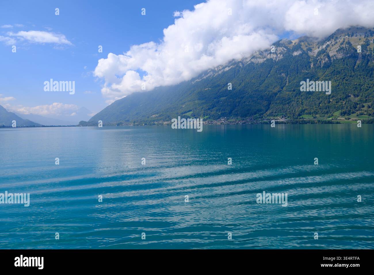 rippling water on Lake Brienz with Alpine mountains Stock Photo