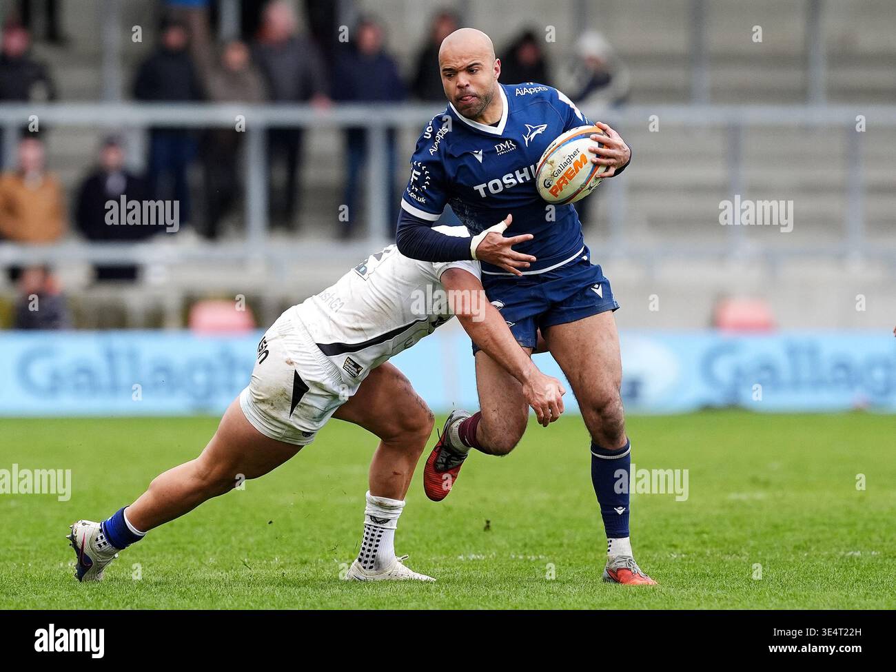 Sale Sharks' Tom O'Flaherty (right) is tackled by Bath Rugby's Cameron ...