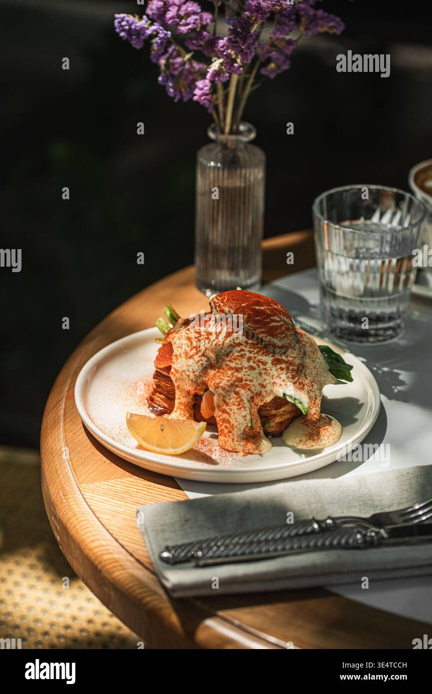 Salmon toast with poached egg and spinach Stock Photo