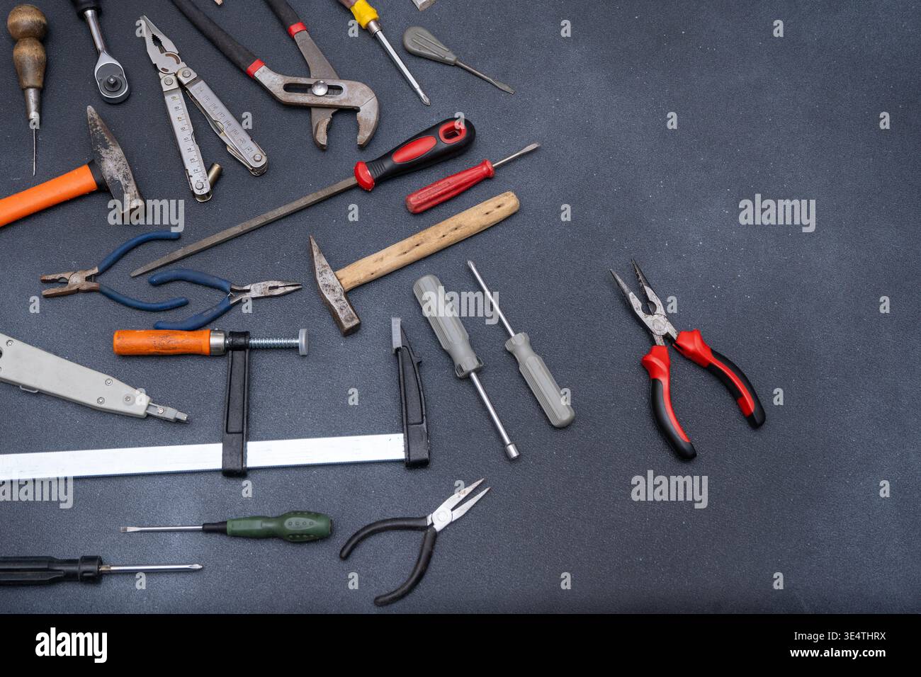 Hand Tools set top view. Professional DIY different Equipment for household. Assorted work and home renovation tool flat lay. Stock Photo