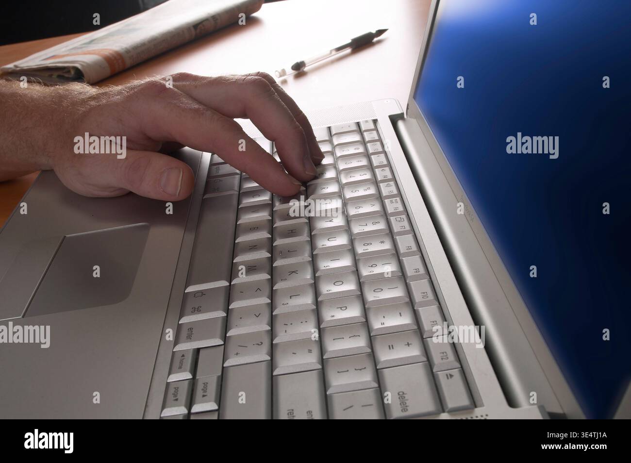Man hand typing on laptop computer, USA Stock Photo