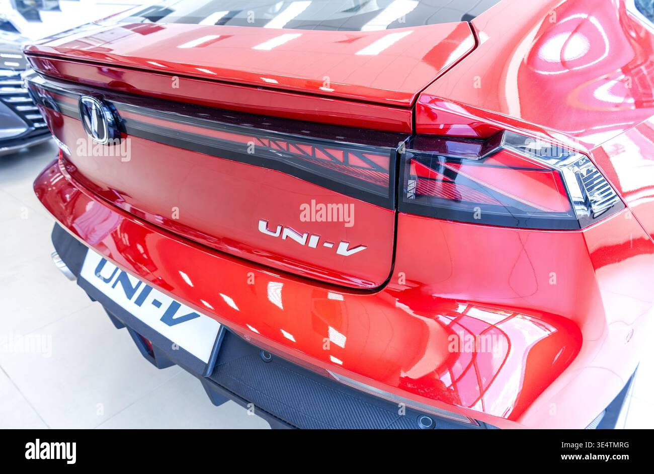 Samara, Russia - April 26, 2025: Rear part of Changan UNI-V red vehicle with logo Stock Photo