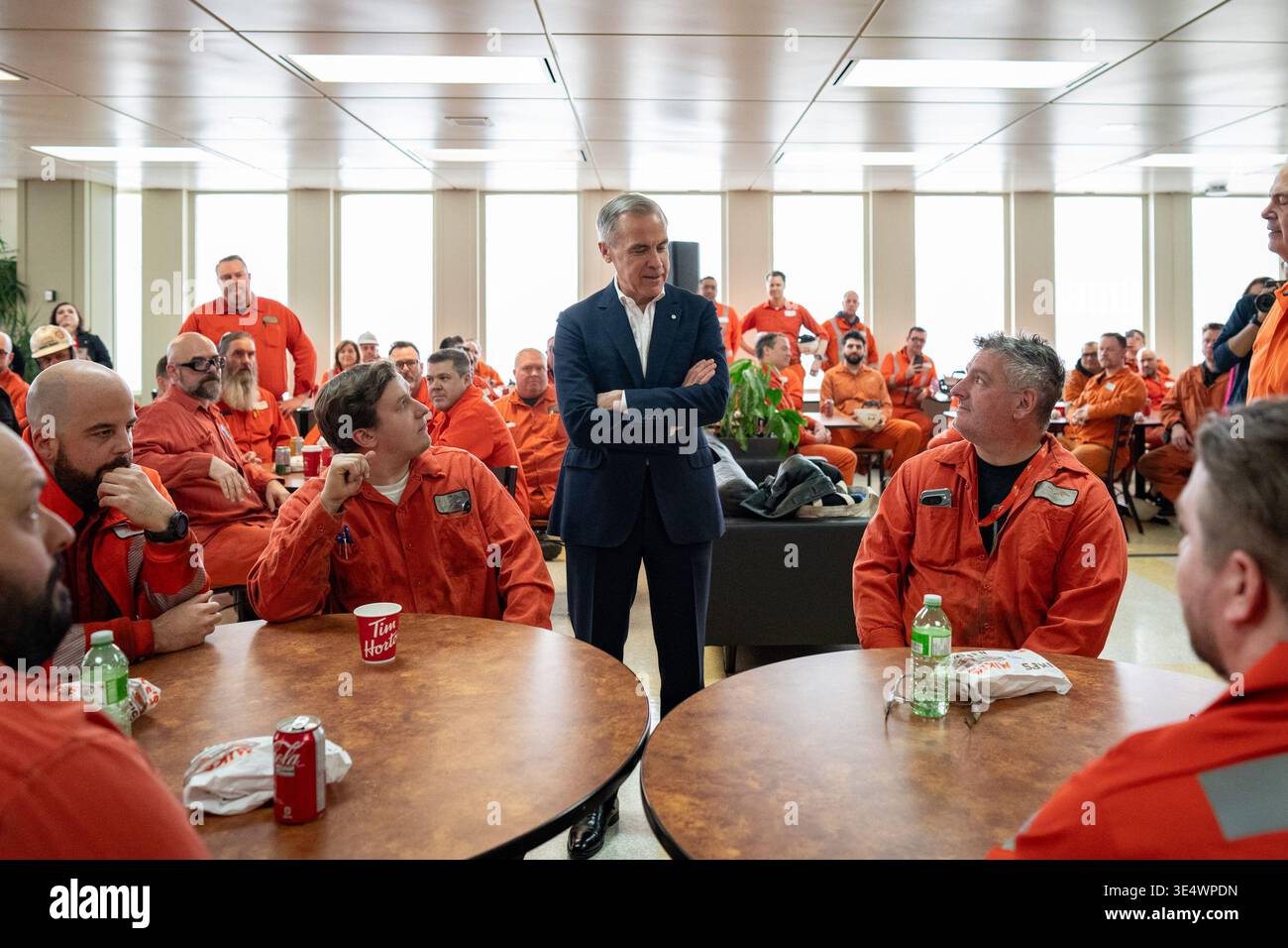 Canada's Prime Minister Mark Carney meets with steelworkers inside the ...