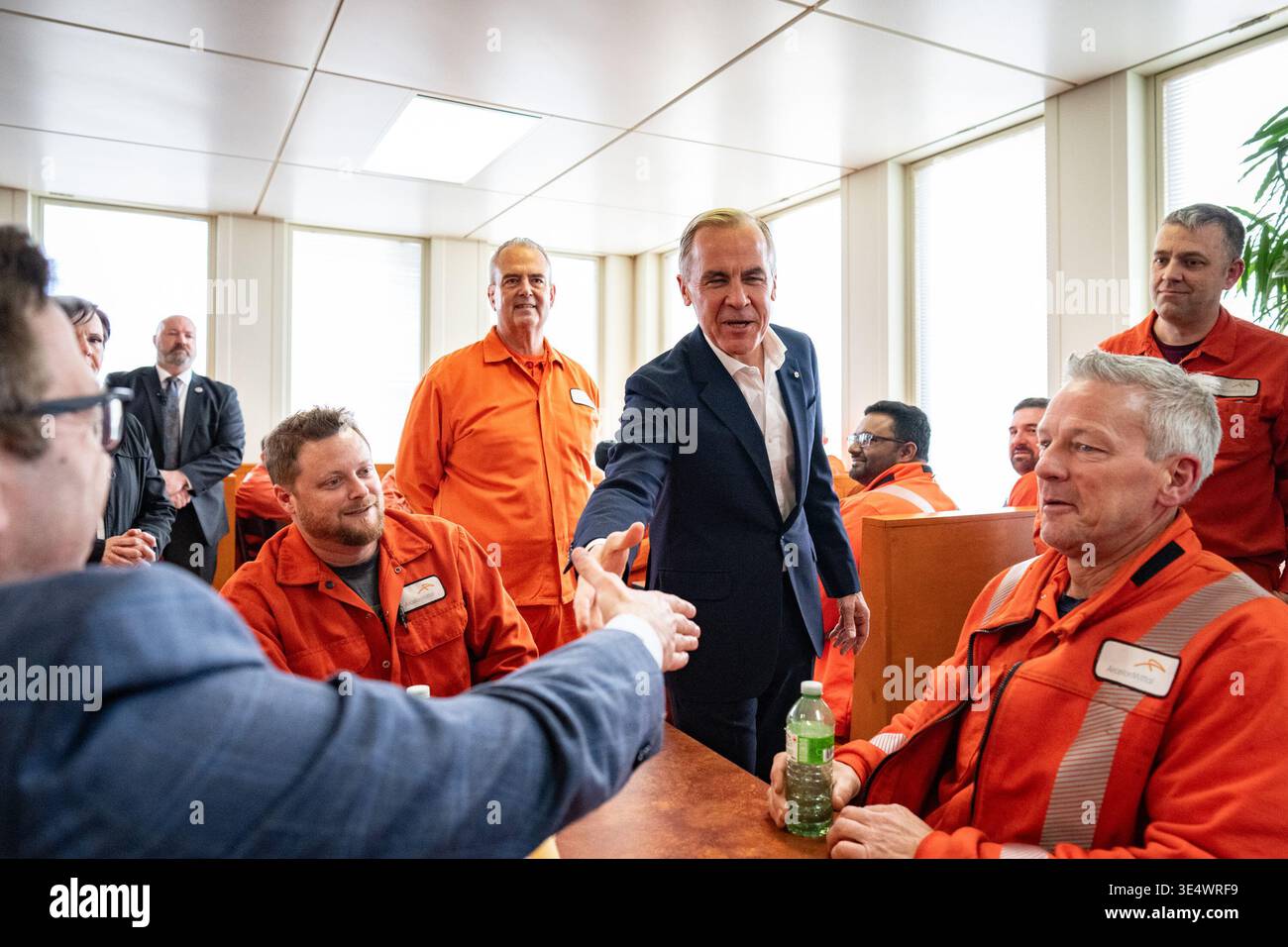 Canada's Prime Minister Mark Carney meets with steelworkers inside the ...