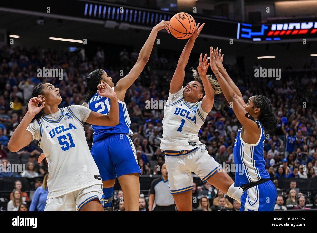 Duke center Arianna Roberson (21) blocks UCLA guard Kiki Rice (1 ...