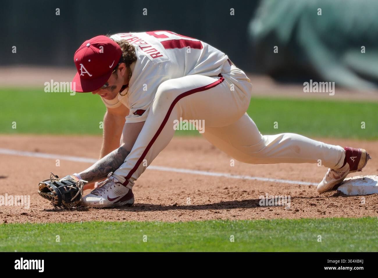 Carter Richey Baseball March 29, 2026: Arkansas first baseman Carter Rutenbar (12) stretches ...