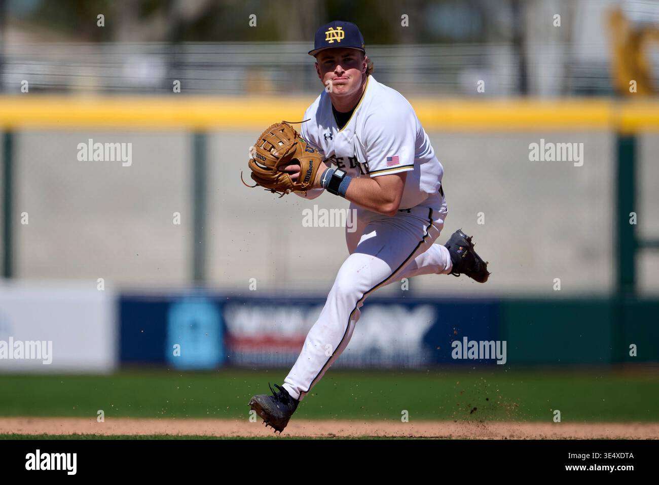 Notre Dame Fighting Irish shortstop Noah Coy (11) throws to first base ...