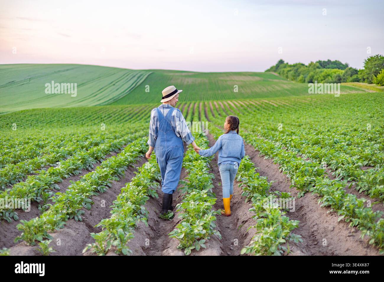 Farmer and Child in Field Stock Photo - Alamy