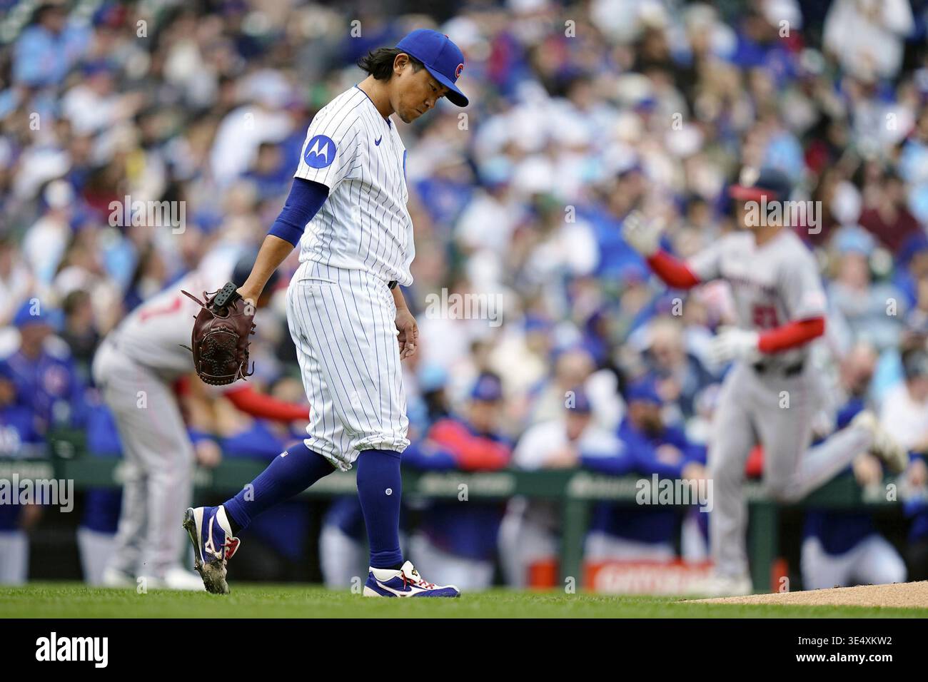 Chicago Cubs starter Shota Imanaga reacts after allowing a three-run ...