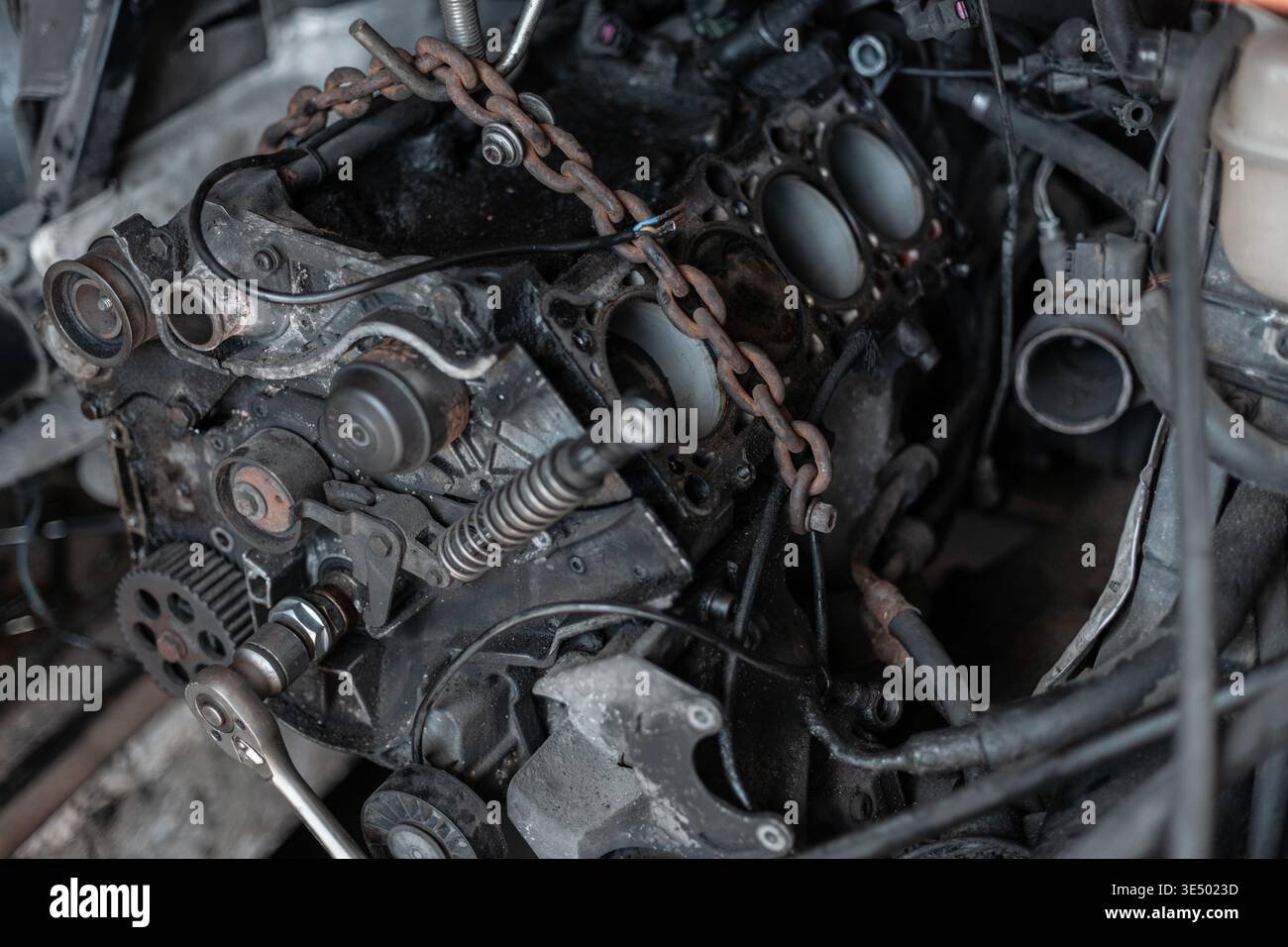Disassembled car dirty engine close-up to engine parts and cylinder ...