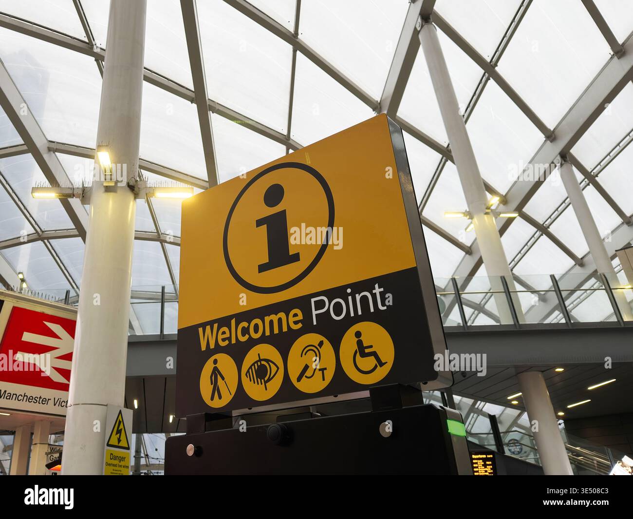 Welcome point information sign displaying accessibility icons in the ...