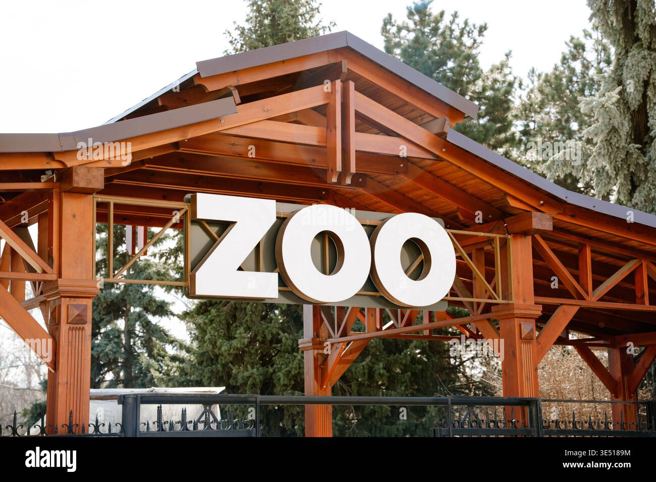 Zoo Sign Design Zoo entrance sign mounted on wooden structure with large bold letters ...