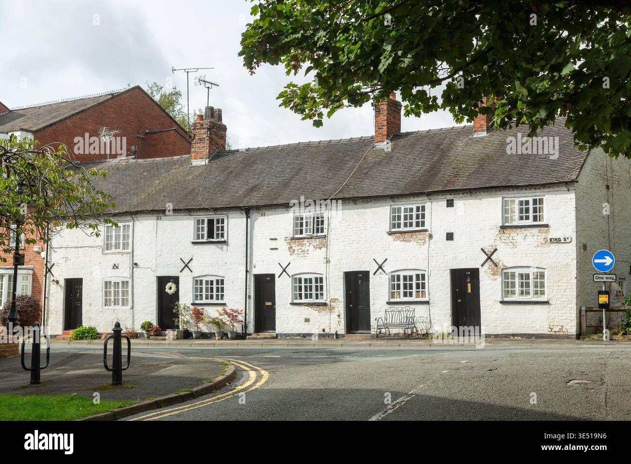 19th-century period country cottages located along King Street in Knutsford, Cheshire, England Stock Photo