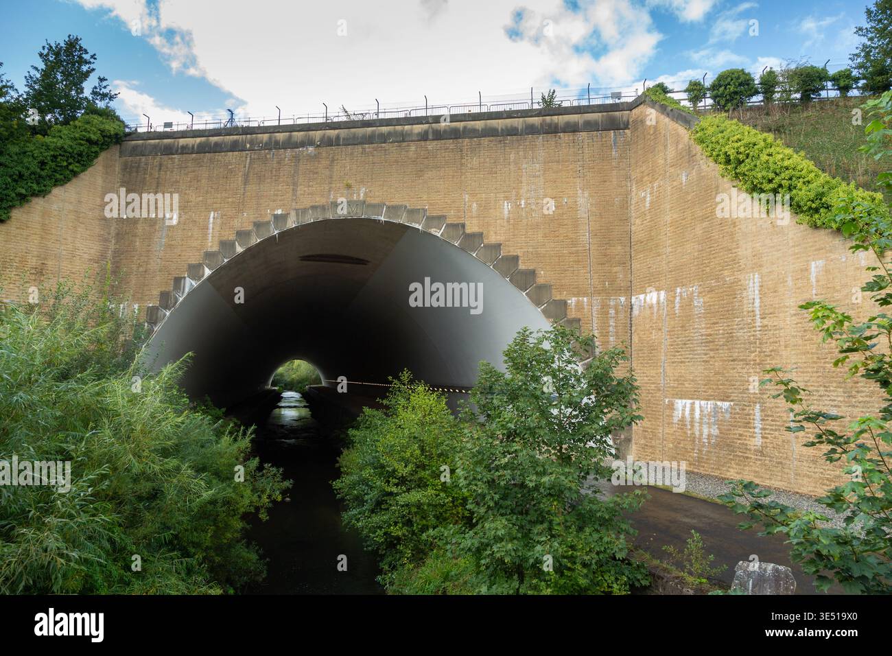 The River Bollin Tunnel located underneath Runway 2 at Manchester Airport. Stock Photo