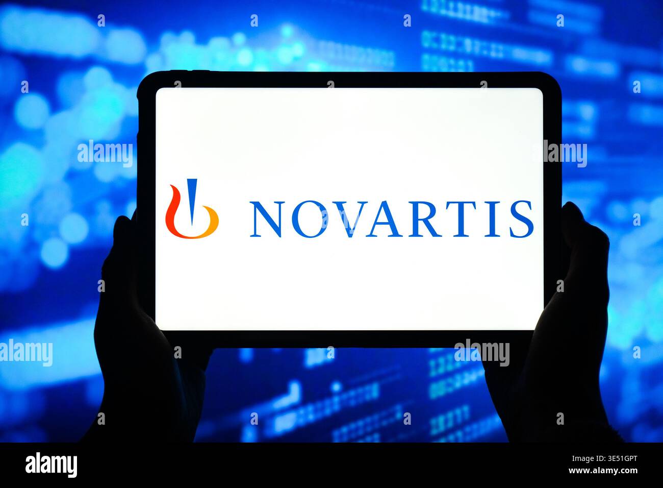 In this photo illustration, the NOVARTIS logo is seen displayed on the ...