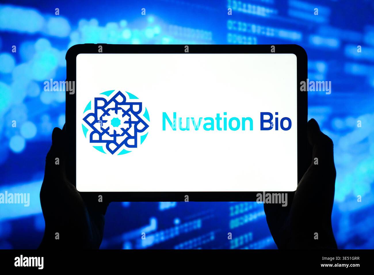 In this photo illustration, the Nuvation Bio logo is seen displayed on ...