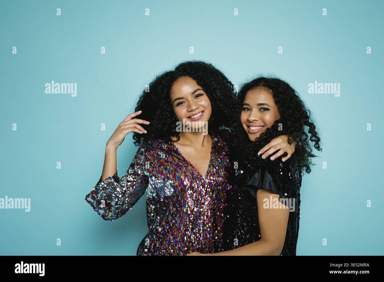Two women standing together hi-res stock photography and images - Alamy