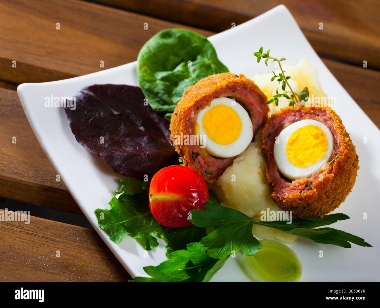Scotch eggs with vegetables Stock Photo