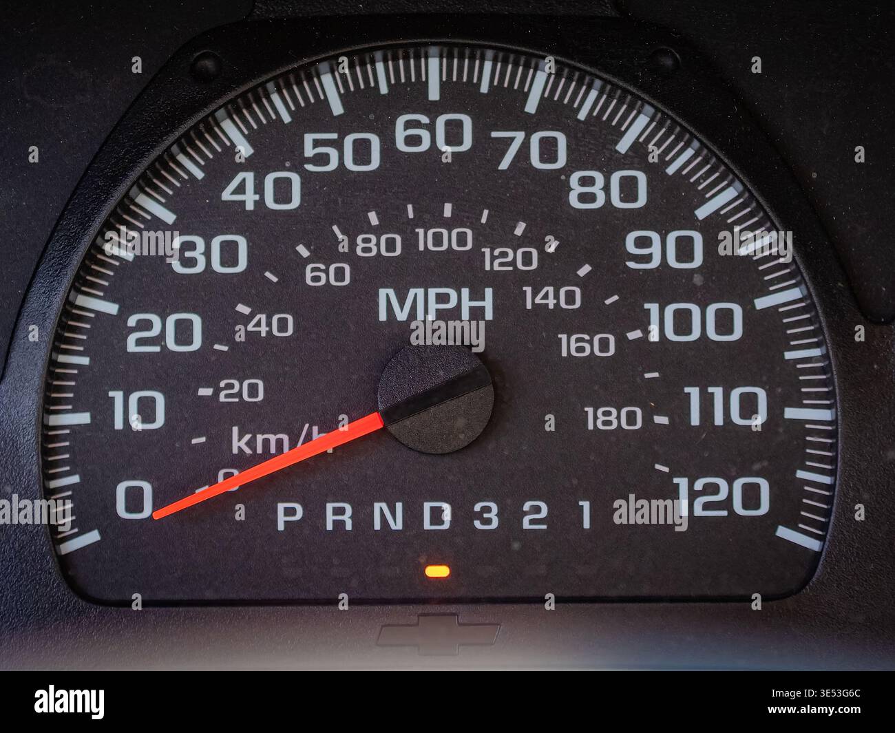 Speedometer Gear Display Macro view of a classic black GM truck speedometer with white MPH and ...