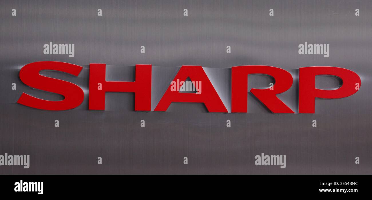 A photo shows the logo of Sharp Corporation in Osaka City, Osaka ...