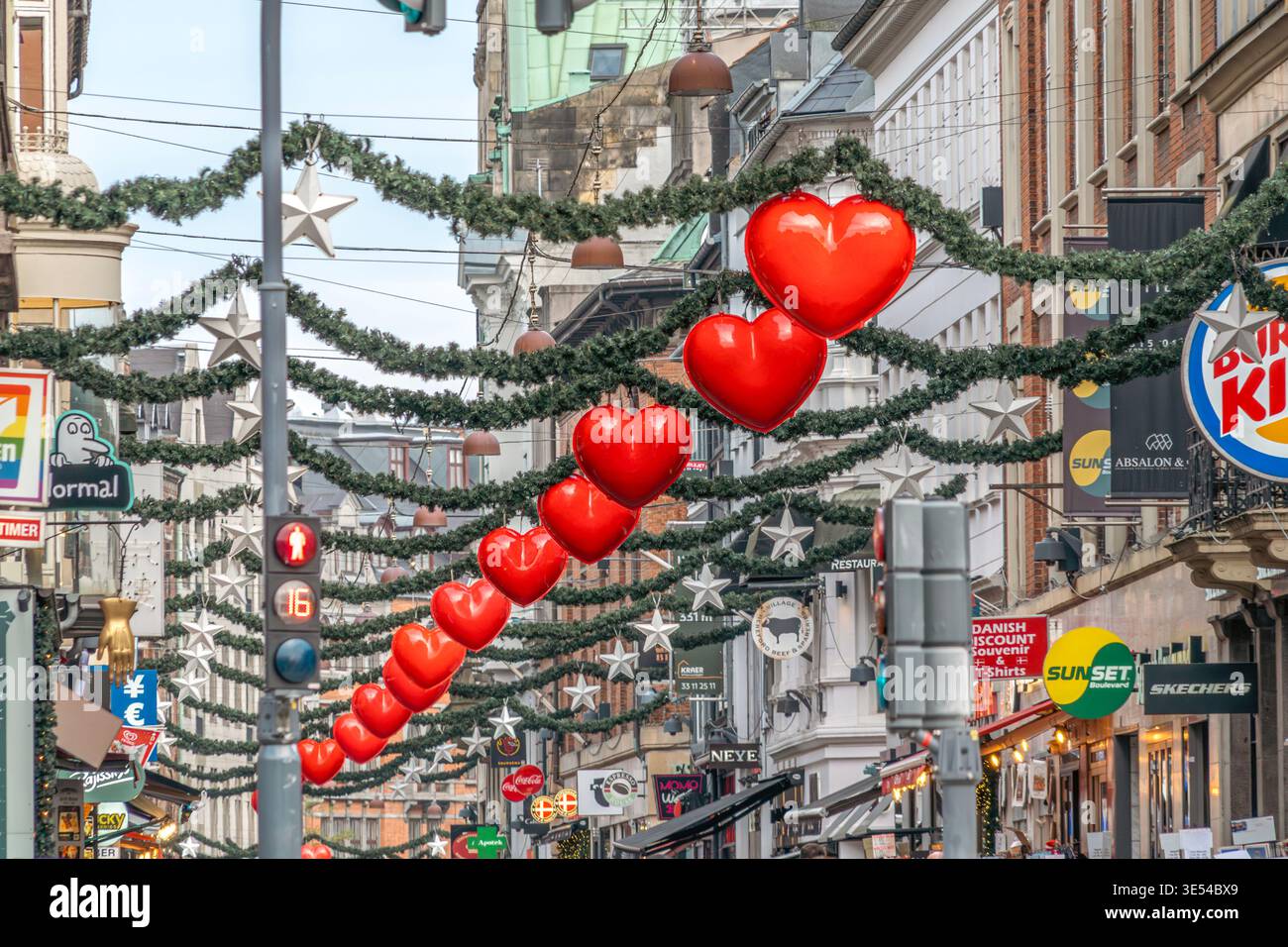Red Hearts Christmas Decorations over Stroget Street in Copenhagen, Denmark, Stroget Pedestrian Street Stock Photo