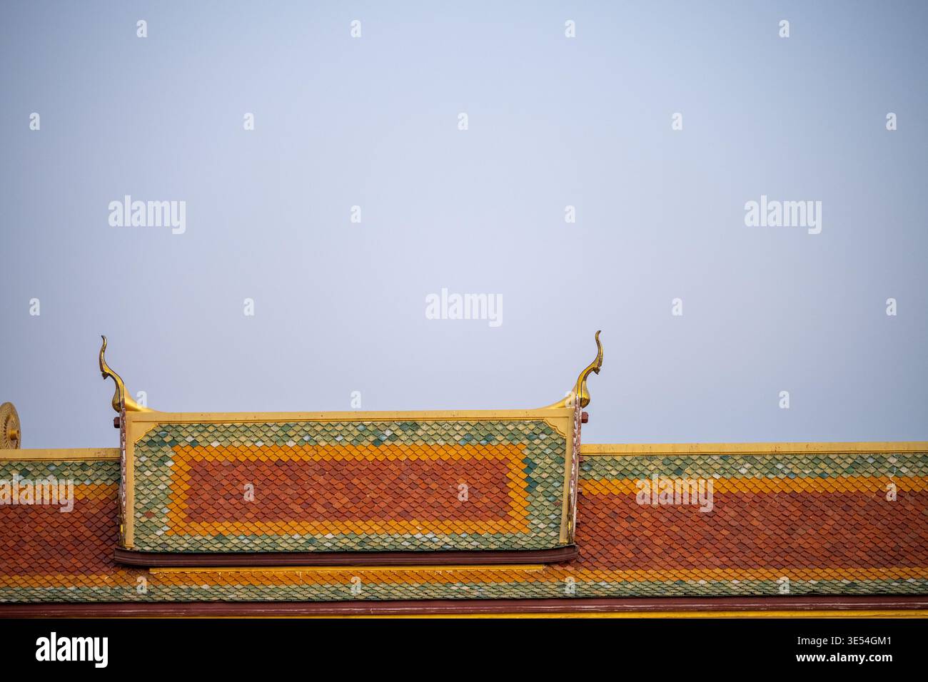 Bangkok Thailand February 1 2026. Large Buddha statue framed by decorative arch with full moon visible in background sky. Stock Photo