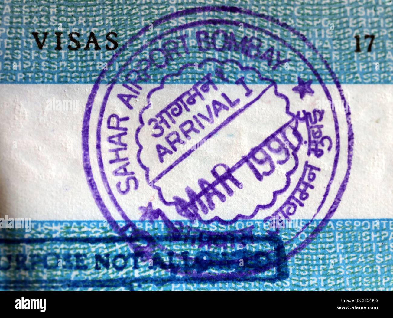 India arrival stamp in passport. Stock Photo