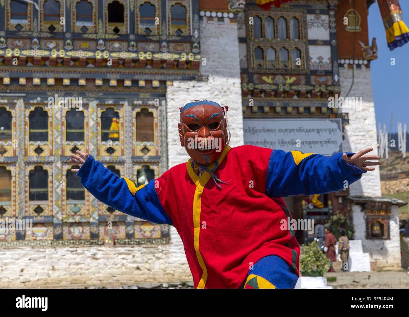 Bhutan, Bumthang, Ura, Masked atsara at the annual Ura Yakchoe festival Stock Photo