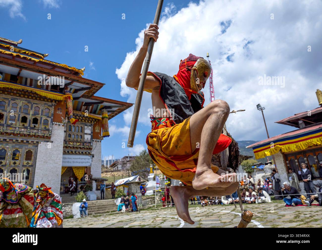 Bhutan, Bumthang, Ura, Masked atsara at the annual Ura Yakchoe festival Stock Photo