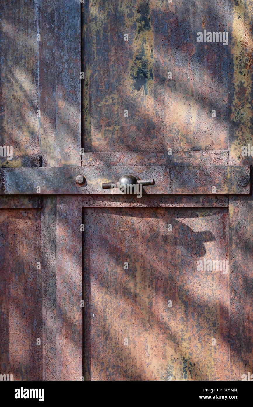 Rustic iron door and beautiful colors. Stock Photo