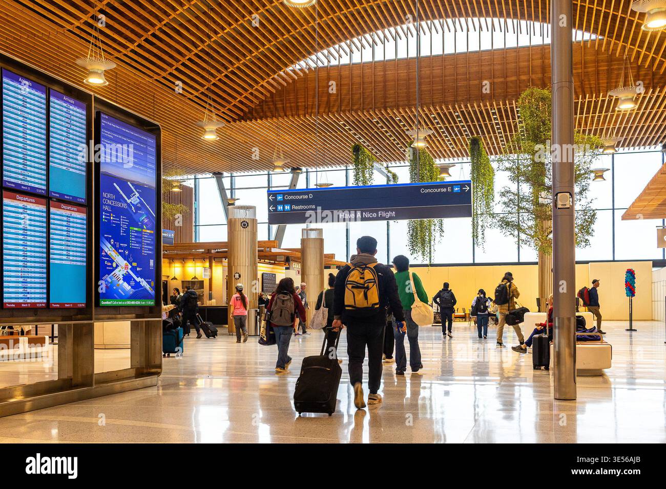 Passengers at Portland International Airport (PDX) in Portland, Oregon ...