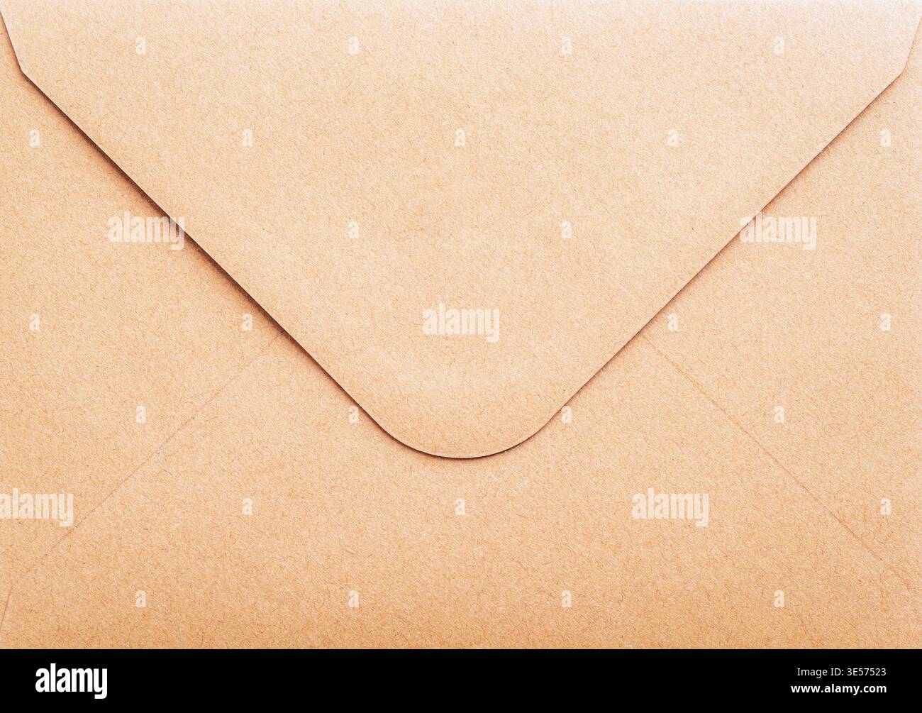 Brown kraft paper envelope texture close up, background. Stock Photo