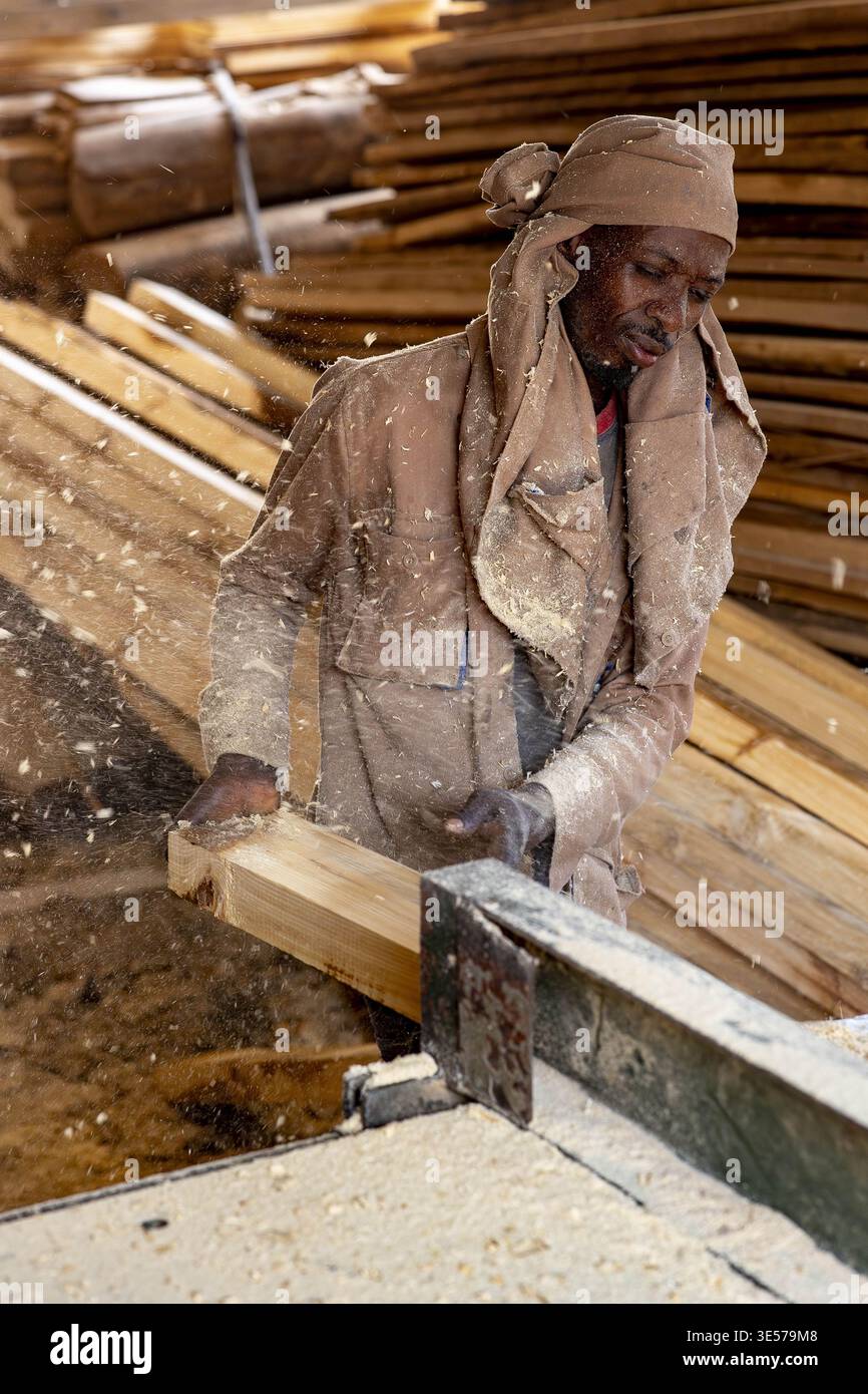 Worker in a carpentry workshop in Kigali, Rwanda Stock Photo