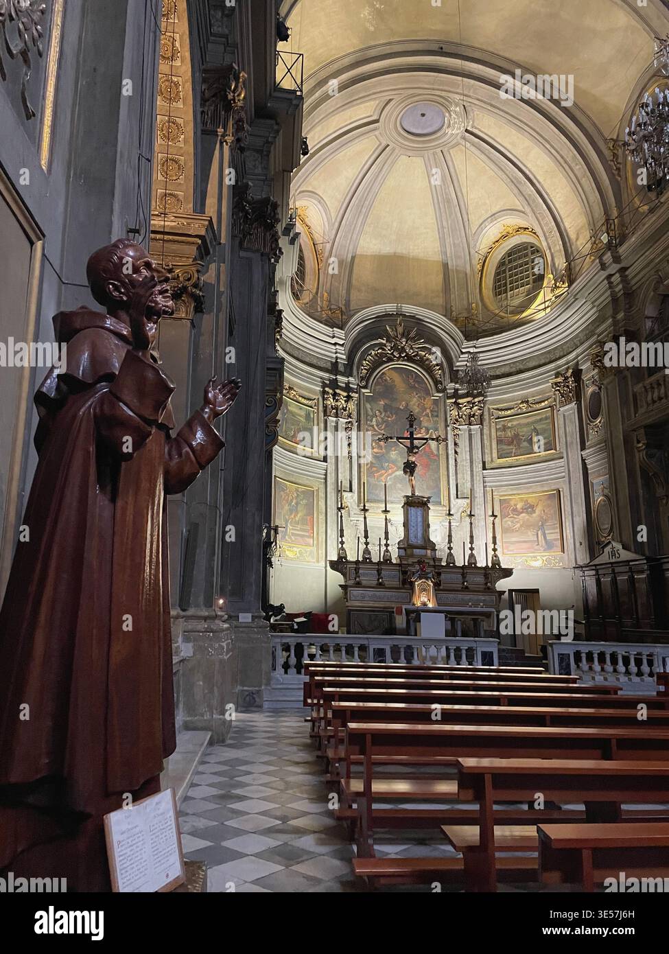 Nice, France.Interior of the Saint Francis of Paola Church (Église Saint-François de-Paule de Nice). Statue of St. Francis of Paola in the foreground. - Smartphone Captured Stock Image