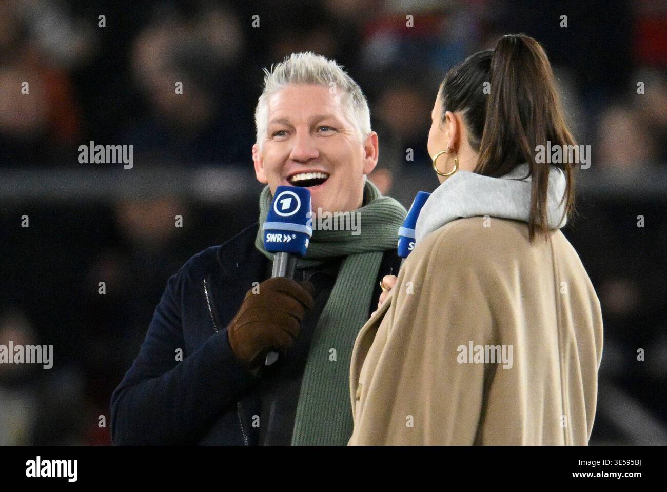 TV expert Bastian Schweinsteiger in interview microphone microphone ...