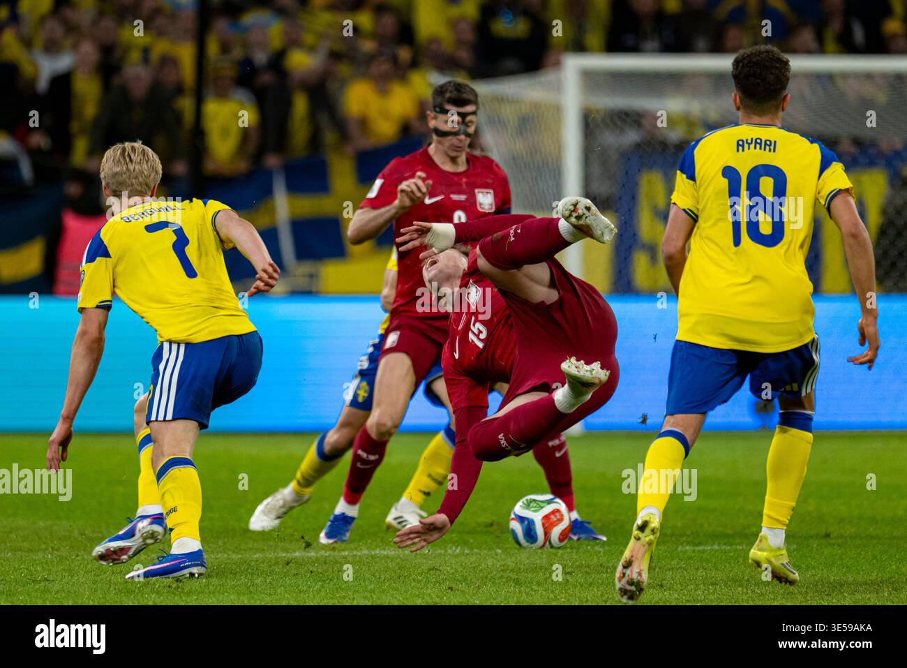 Oskar Pietuszewski of Poland fouled during the FIFA World Cup 2026 ...