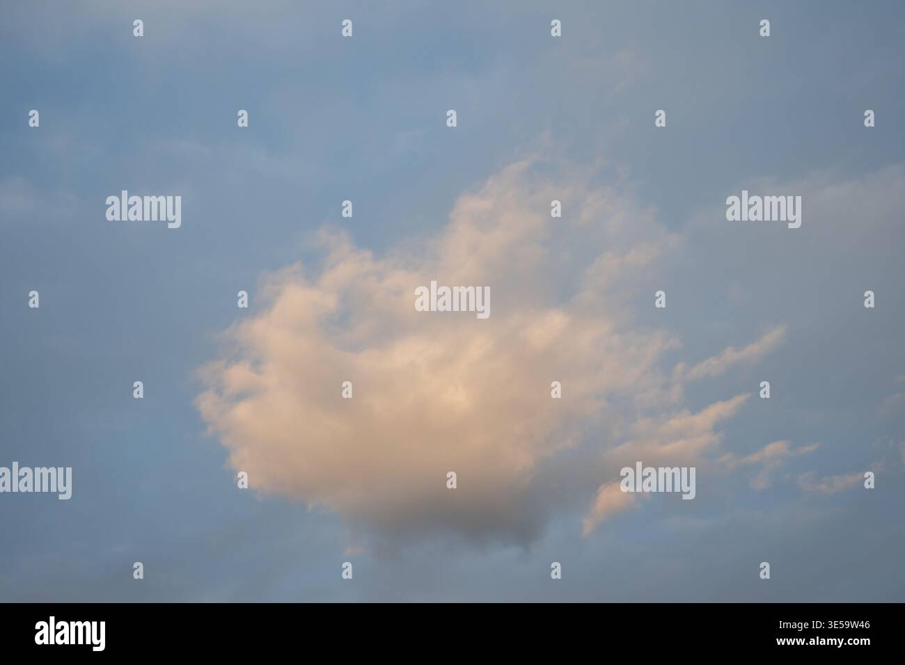 Bright blue sky with fluffy white clouds scattered across the horizon ...