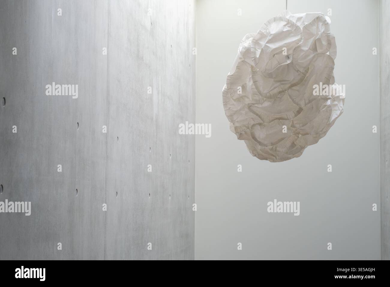 Hanging crumpled paper object minimal abstract interior design concept Stock Photo