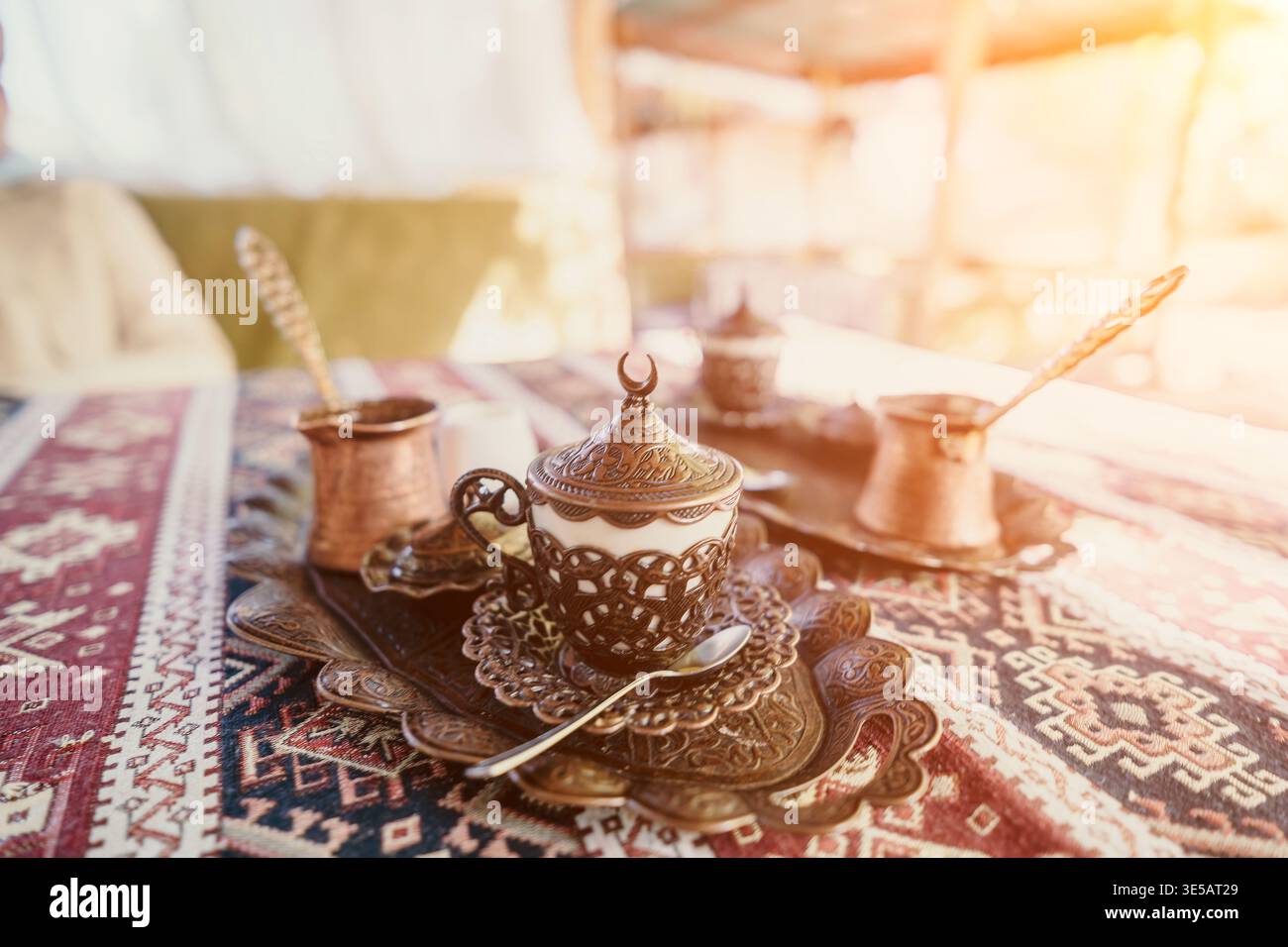 Traditional Turkish Coffee Setup on Ornate Tablecloth Stock Photo