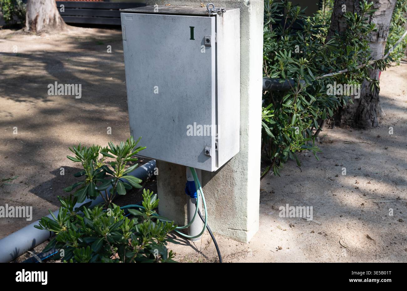 Outdoor electrical control box with cable connection on concrete post ...