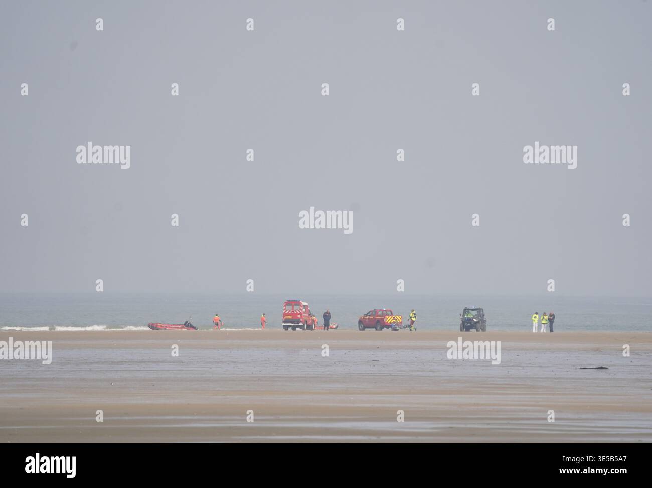 Members of the French authorities carry out a rescue operation after ...