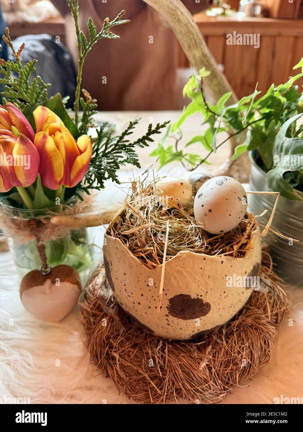A beautifully decorated wooden dining table inside Stock Photo