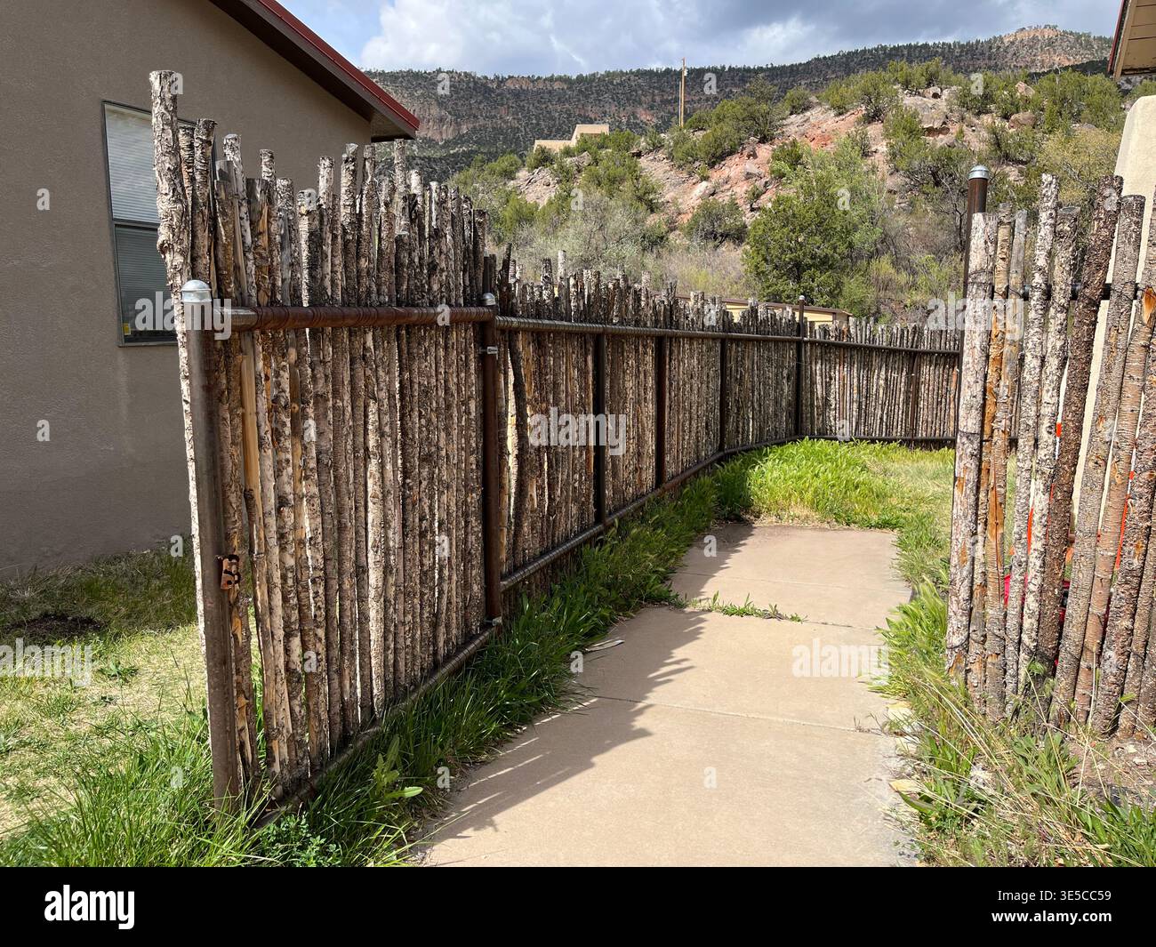 Traditional southwestern wood fence, New Mexico, United States - Smartphone Captured Stock Image