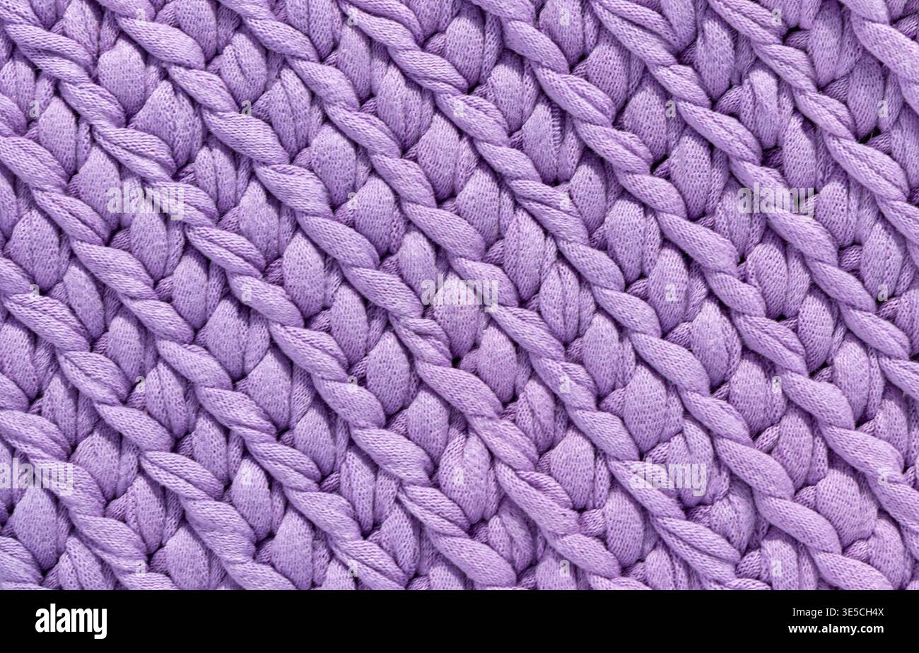 Cable knitting pattern in seamless color pattern.  Knit background with ornament. Knitted texture. Stock Photo