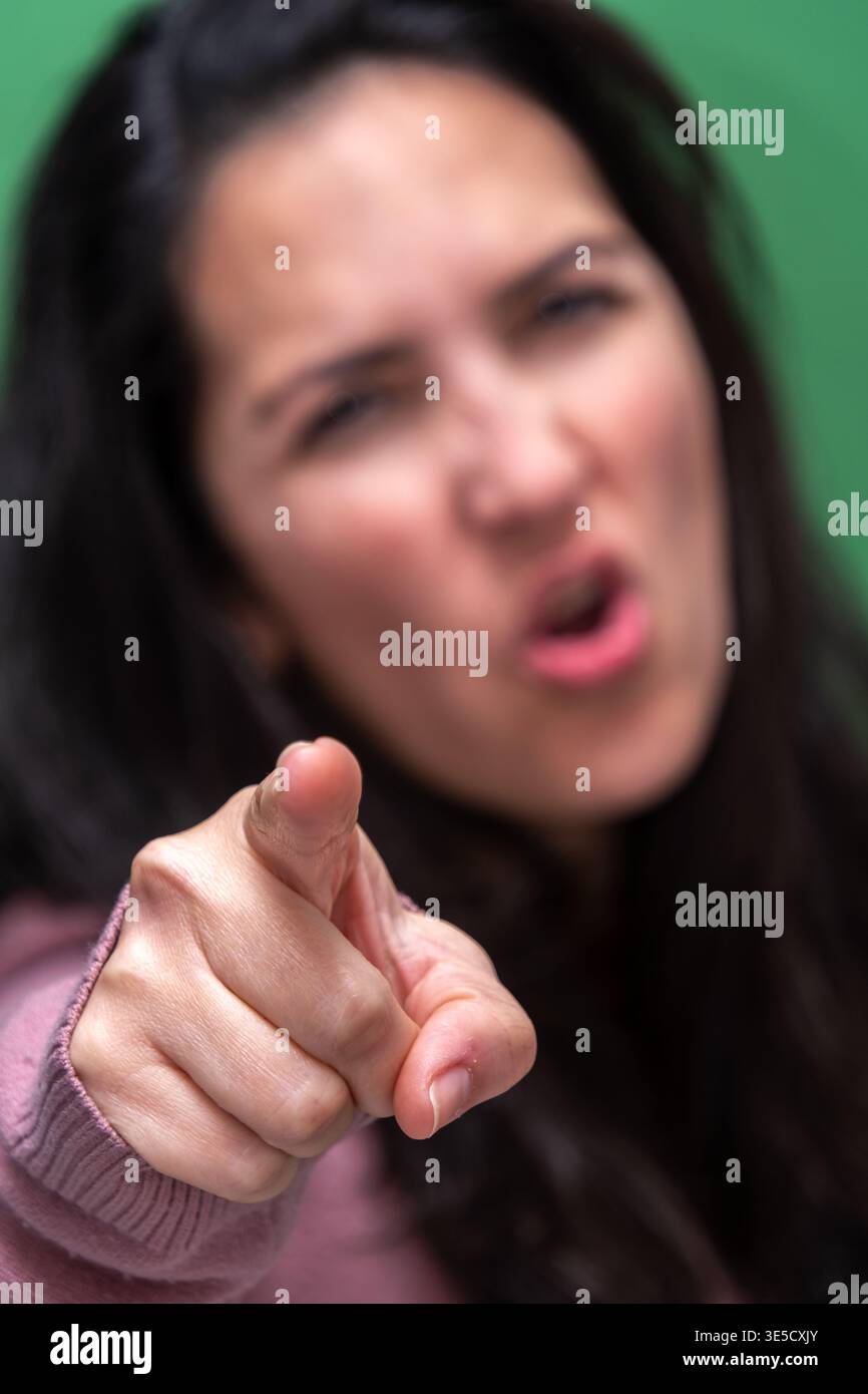 Angry woman pointing finger hi-res stock photography and images - Alamy